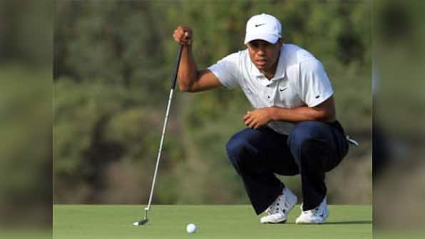 Woods back on top in Sydney