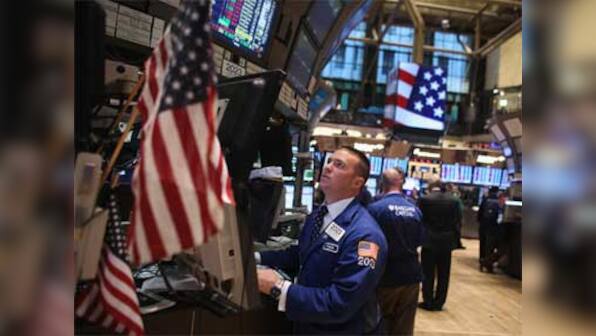 Wall Street ends up on data, euro slips on debt fears