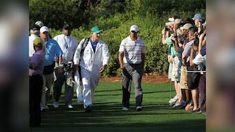 Woods to face Scott and former caddy in Presidents Cup
