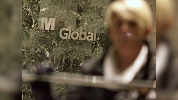 MF Global mixed client funds, transferred abroad: Report