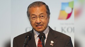 Malaysia to defer three China-backed projects worth $22 billion; Mahathir Mohamad says need to resolve 'financial deficit' problem