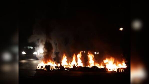 Protestors, police clash for third day in Bahrain along highway west