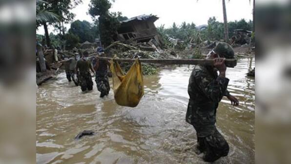 Philippines storm toll exceeds 1,000 as cities prepare burials