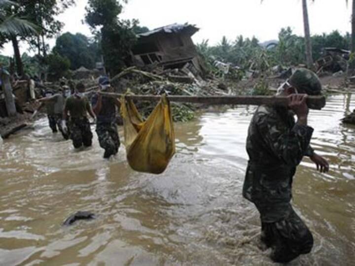 Philippines storm toll exceeds 1,000 as cities prepare burials