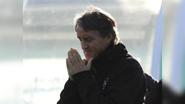 EPL: Mancini wants away-day cheer for Man City