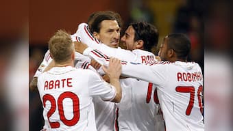 Milan go top despite Robinho miss and teargas