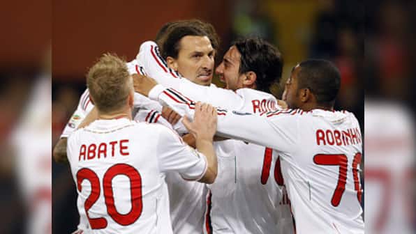 Milan go top despite Robinho miss and teargas