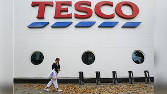 Retail giants fume over U-turn on FDI, Tesco puts cash and carry on hold 