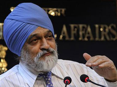 Ahluwalia downplays rupee concerns, says defending currency not worth the risk Ahluwalia downplays rupee concerns, says defending currency not worth the risk
