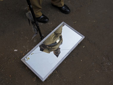 Mumbai cops stretched, yet they'll do more Mumbai cops stretched, yet they'll do more