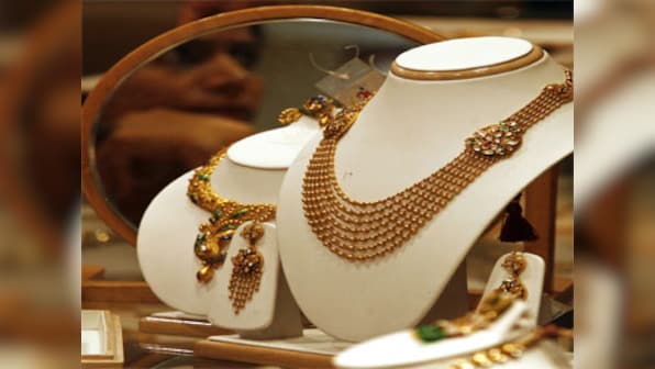 Gold at 2-week high on gains in equities, euro 