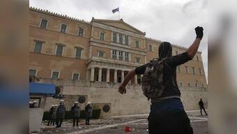 Greece passes austerity budget after street clashes