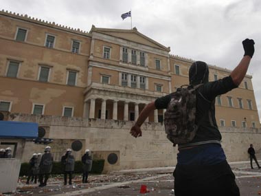Greece passes austerity budget after street clashes Greece passes austerity budget after street clashes