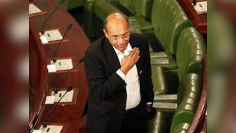 Tunisia installs former dissident as president 