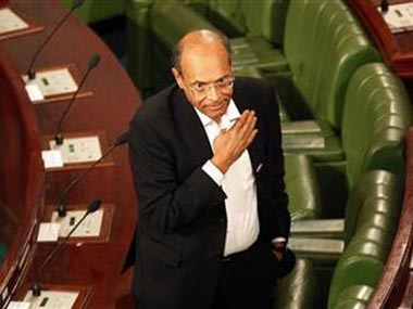 Tunisia installs former dissident as president Tunisia installs former dissident as president