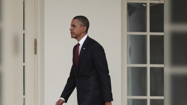 Obama refuses to back down on payroll tax fight with Republicans