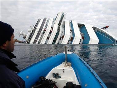 File photo of the Costa Concordia after it capsized. AP image