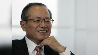 Canon's president steps down as earnings outlook falters