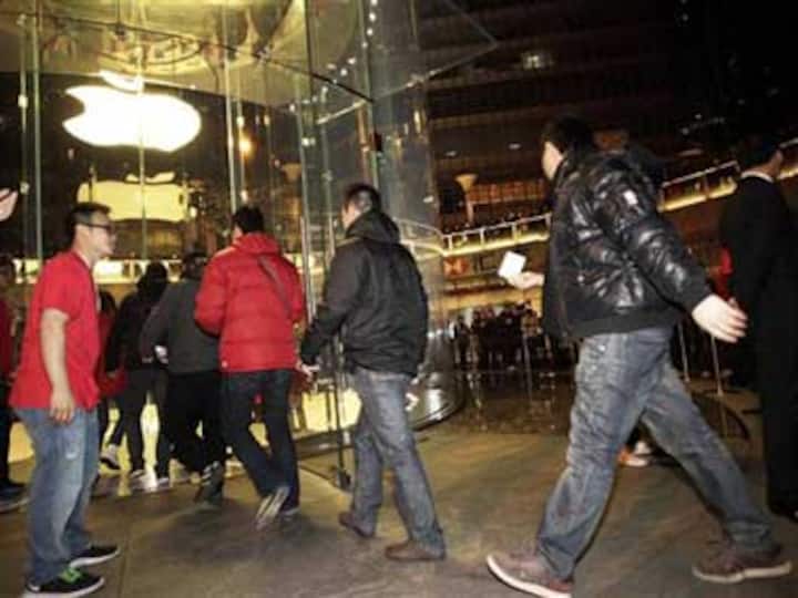 Apple to stop sales of iPhone 4S in China after attack on store 