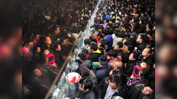 Thousands protest in central China over investment scams - reports
