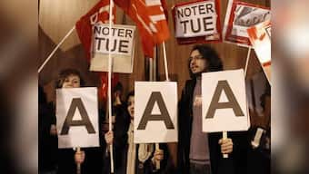 Euro empire totters on rating shock; France loses AAA status