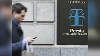 Banks dealing with Iran get US sanctions; those trading in energy dollars don't 