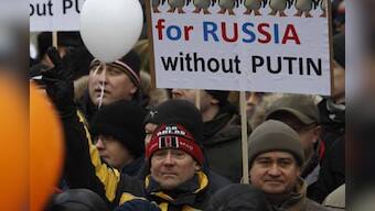 Police arrest anti-Putin protesters in Moscow