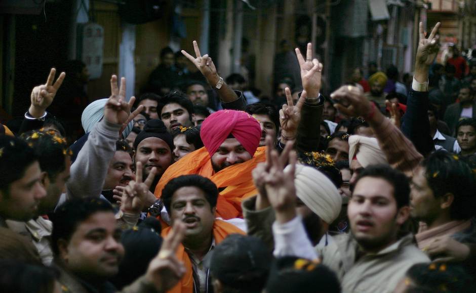 Supporters of India's main opposition Bharatiya Janata Party (BJP) leader and former Indian cricketer Navjot Singh Sidhu, center wearing pink turban, during his roadshow on the last day of campaigning for upcoming Assembly elections in Amritsar, India, Saturday, Jan. 28, 2012. (AP Photo/Altaf Qadri) Supporters of India's main opposition Bharatiya Janata Party (BJP) leader and former Indian cricketer Navjot Singh Sidhu, center wearing pink turban, during his roadshow on the last day of campaigning for upcoming Assembly elections in Amritsar, India, Saturday, Jan. 28, 2012. (AP Photo/Altaf Qadri)