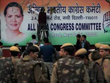 Cong sees BJP hand in throwing of black ink on Sonia's poster Cong sees BJP hand in throwing of black ink on Sonia's poster
