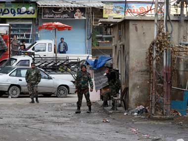 Syrian troops storm Damascus suburb Syrian troops storm Damascus suburb