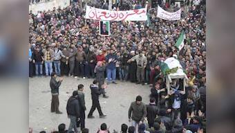 Syrian troops storm rebel neighbourhoods near Damascus