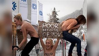 Topless Ukrainian protesters disrupt Davos event