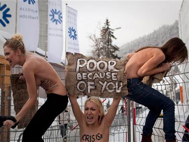 Topless Ukrainian protesters disrupt Davos event Topless Ukrainian protesters disrupt Davos event