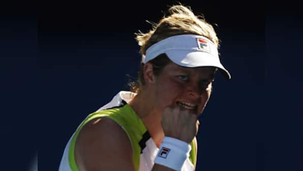 Hobbling Clijsters saves four match points to beat Li