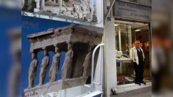 Fitch: Greece will default, but it will be orderly