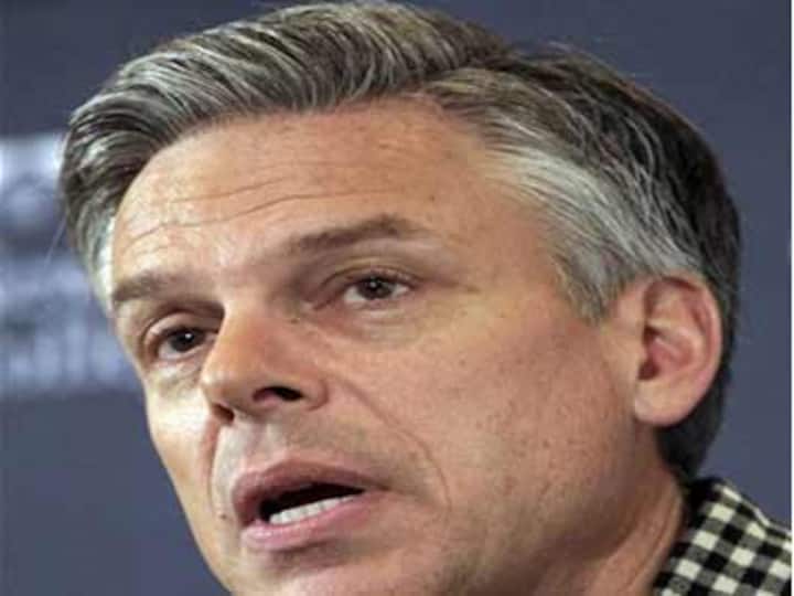 Huntsman objects to ad featuring his adopted kids