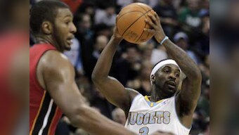 Lawson helps Nuggets beat Heat on return