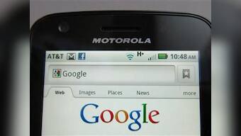 Motorola posts loss, awaits Google deal approval