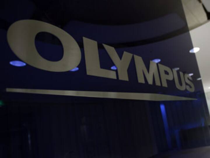 Olympus sues current president, ex-directors over $1.7 bn fraud