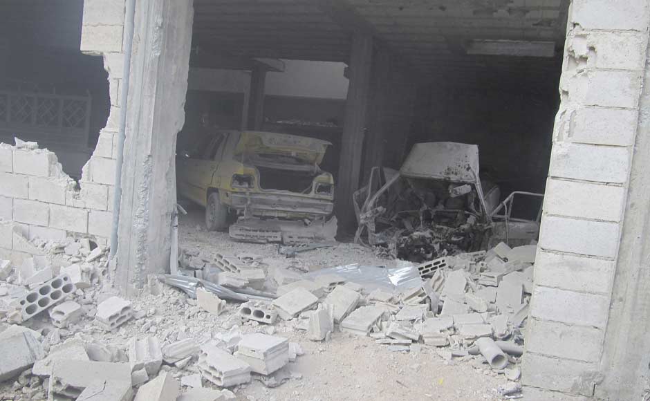 A damaged house is seen in Baba Amro near Homs. Reuters A damaged house is seen in Baba Amro near Homs. Reuters