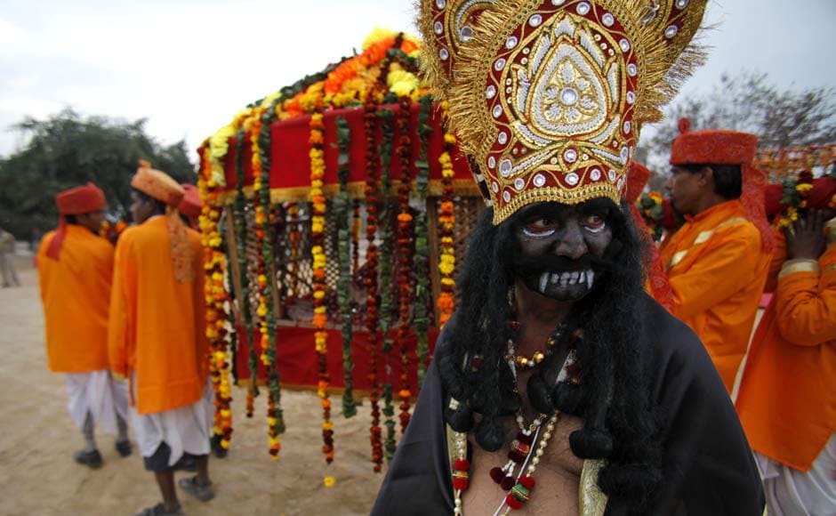 A devotee dressed as a demon participates in a procession ahead of Shivratri festival, in Jammu. AP A devotee dressed as a demon participates in a procession ahead of Shivratri festival, in Jammu. AP