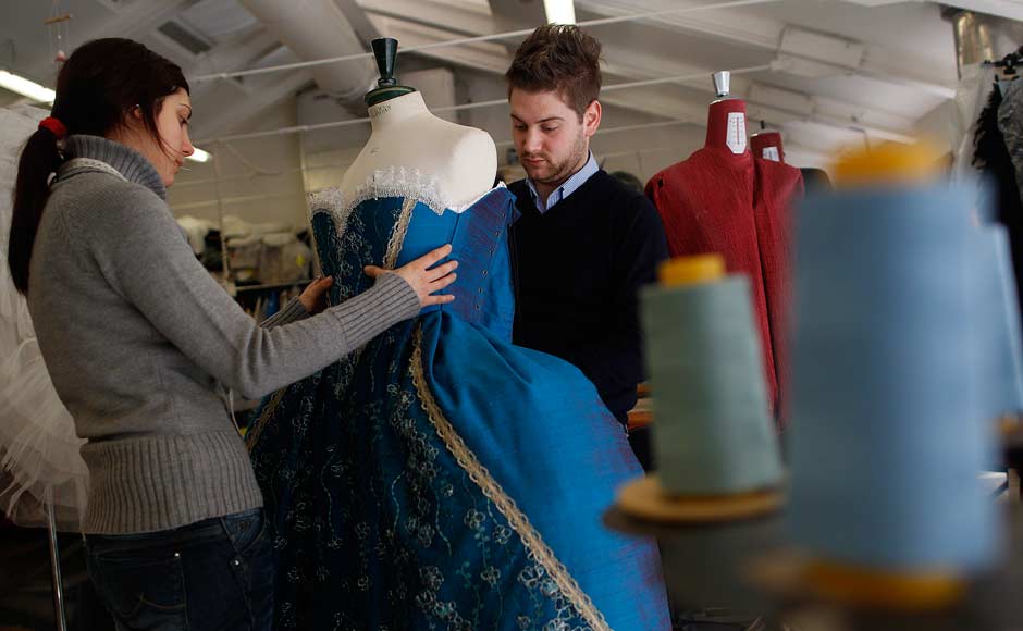 Tailors adjust a dress at the atelier of costume designer Stefano Nicolao in downtown Venice. Reuters Tailors adjust a dress at the atelier of costume designer Stefano Nicolao in downtown Venice. Reuters