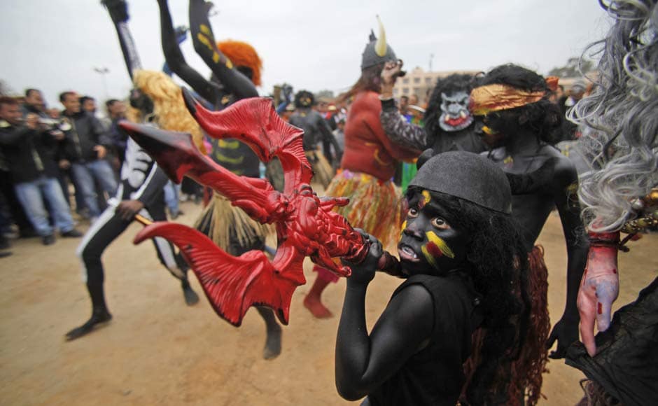 A child dressed as a demon participates in a procession ahead of Shivratri festival, in Jammu. AP A child dressed as a demon participates in a procession ahead of Shivratri festival, in Jammu. AP