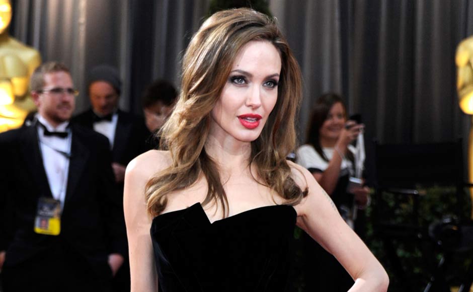 Angelina Jolie arrives at the 84th Annual Academy Awards held at the Hollywood & Highland Center. Getty Images.