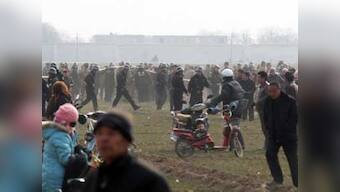 12 killed as riots break out in China's Xinjiang region  
