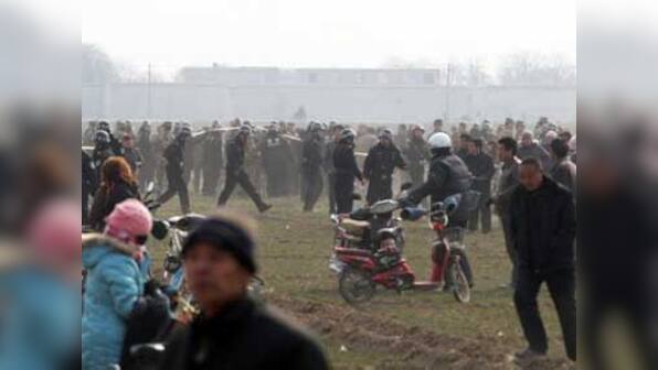 12 killed as riots break out in China's Xinjiang region  
