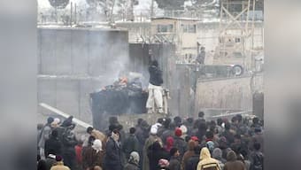 Obama apologises to Karzai over Koran burning