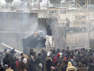 Obama apologises to Karzai over Koran burning Obama apologises to Karzai over Koran burning