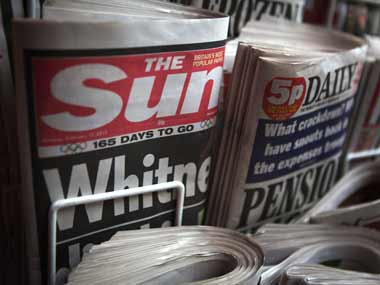Murdoch facing hostile reception from staff in Britain Murdoch facing hostile reception from staff in Britain