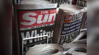 Murdoch facing hostile reception from staff in Britain